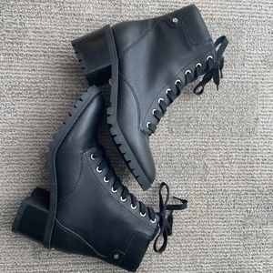 Black Aldo combat boots on low heel